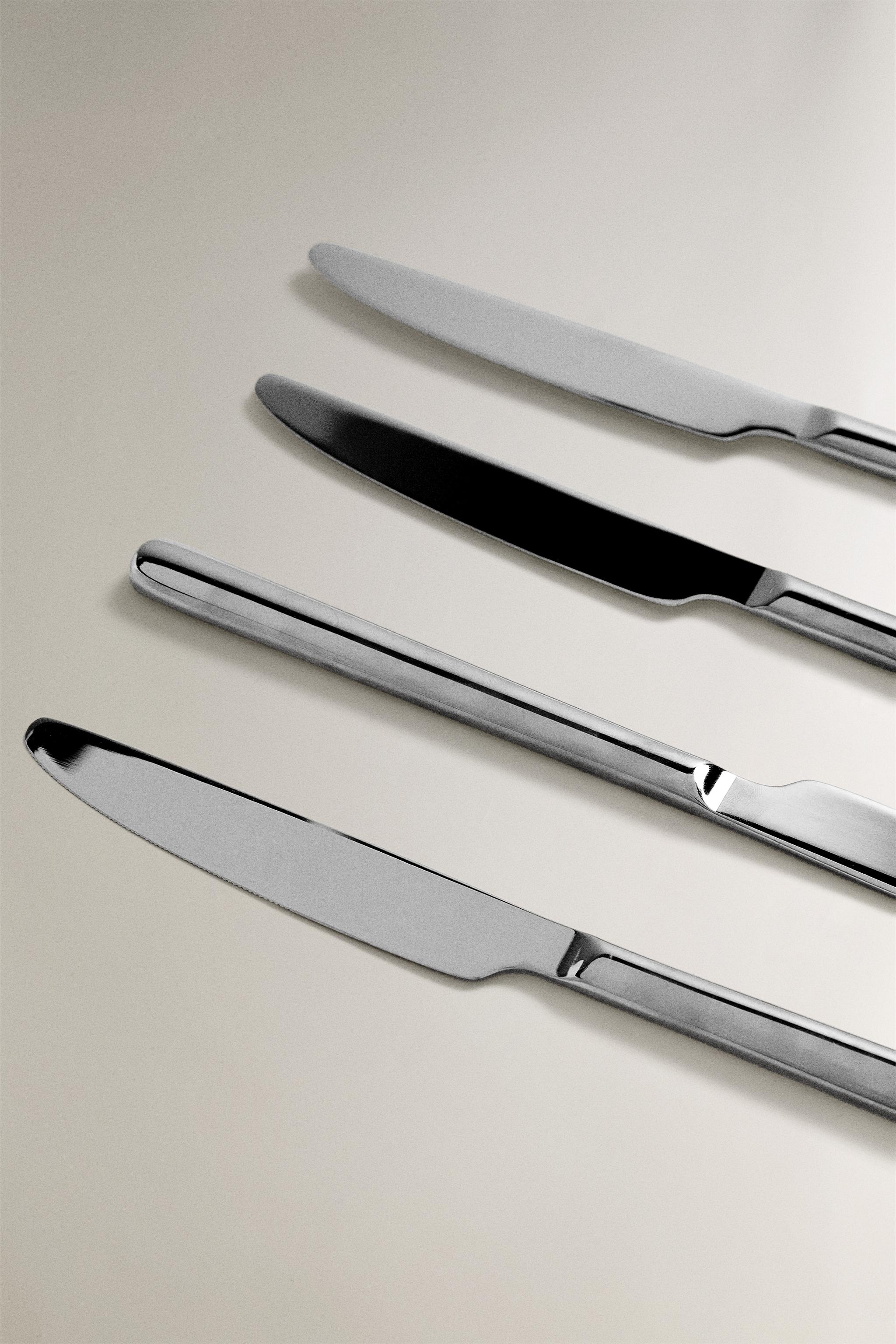 SET OF SHINY STEEL KNIVES (SET OF 4)